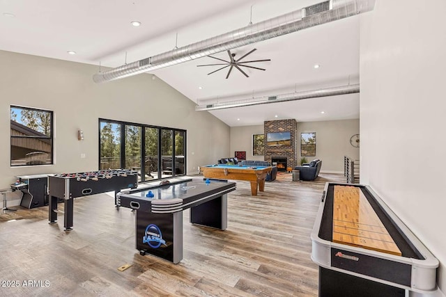 301 S O Leary St, Flagstaff, AZ 86001 - game room featuring visible vents, wood finished floors, pool table, a high ceiling, and a fireplace