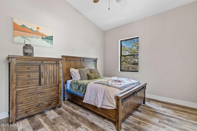 301 S O Leary St, Flagstaff, AZ 86001 - bedroom with lofted ceiling, a ceiling fan, baseboards, and wood finished floors