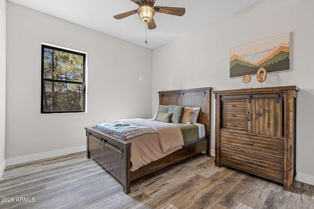 301 S O Leary St, Flagstaff, AZ 86001 - bedroom with a ceiling fan, baseboards, and wood finished floors