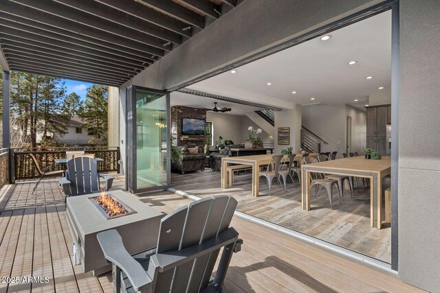 301 S O Leary St, Flagstaff, AZ 86001 - deck featuring outdoor dining space and an outdoor living space with a fire pit