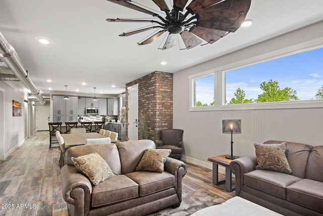 301 S O Leary St, Flagstaff, AZ 86001 - living area featuring light wood-style floors, baseboards, a ceiling fan, and recessed lighting