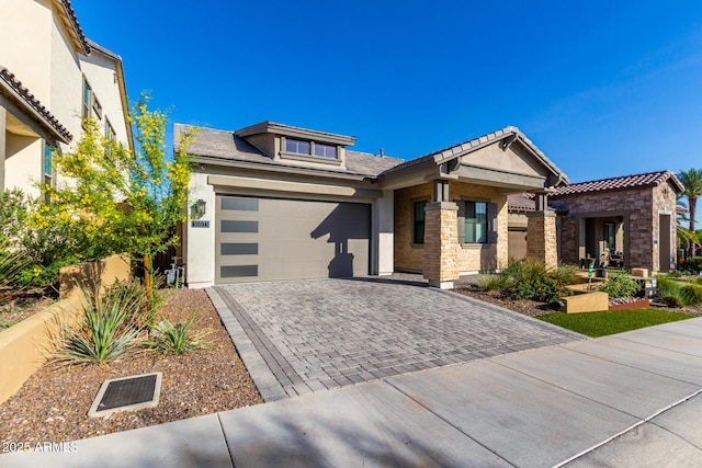 view of front of home with a garage