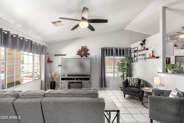 863 W 14th Ave, Apache Junction, AZ 85120 - living room featuring a ceiling fan, lofted ceiling, and light tile patterned floors