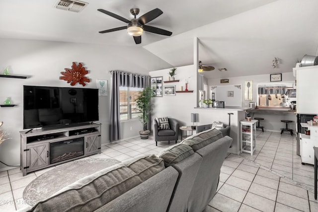 863 W 14th Ave, Apache Junction, AZ 85120 - living area featuring a ceiling fan, lofted ceiling, and light tile patterned floors