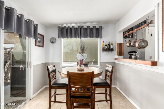 863 W 14th Ave, Apache Junction, AZ 85120 - tiled dining space with baseboards