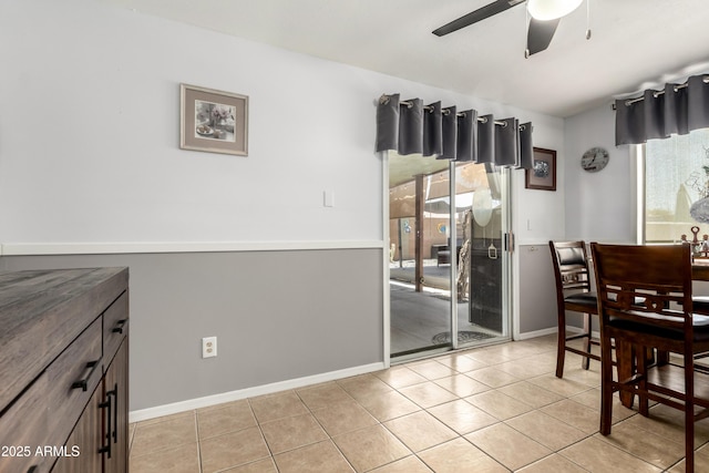 863 W 14th Ave, Apache Junction, AZ 85120 - dining space featuring healthy amount of natural light, ceiling fan, and light tile patterned flooring