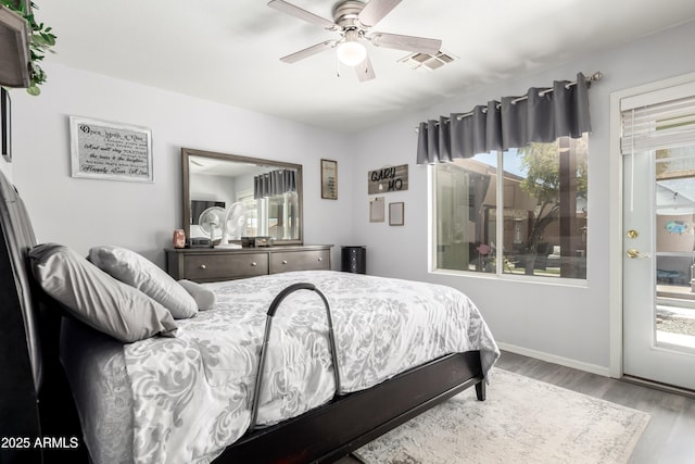 863 W 14th Ave, Apache Junction, AZ 85120 - bedroom featuring wood finished floors and a ceiling fan