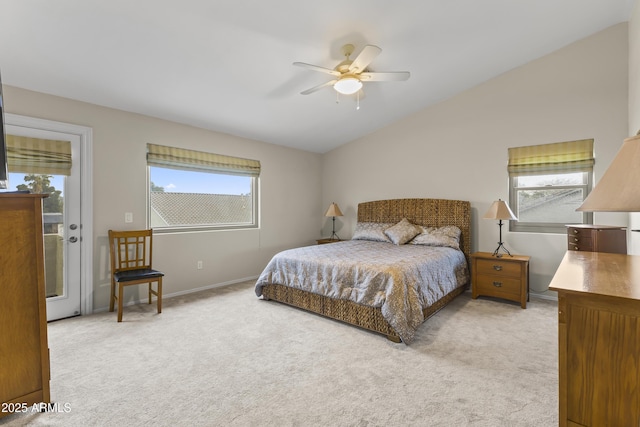 carpeted bedroom with vaulted ceiling, ceiling fan, and access to outside