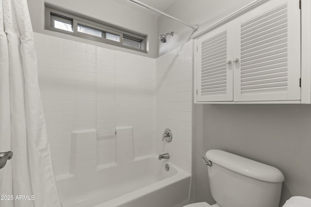 bathroom with shower / bath combination with curtain and toilet