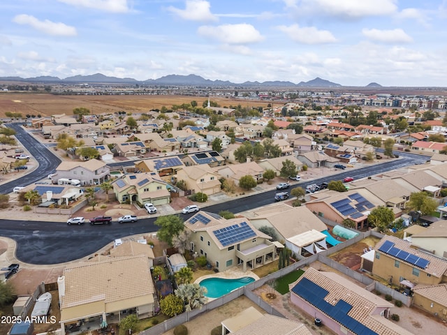 birds eye view of property featuring a mountain view