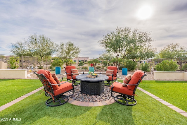 view of patio featuring a fire pit