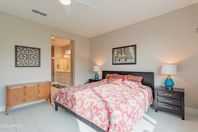 bedroom featuring ensuite bath and ceiling fan