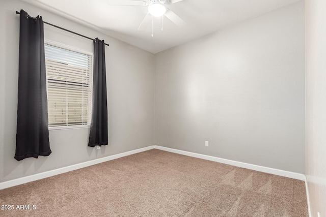 unfurnished room featuring carpet floors and ceiling fan