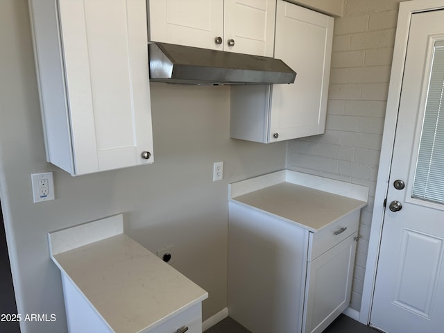 kitchen with white cabinets