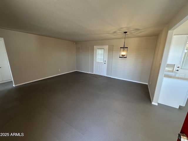 interior space featuring a textured ceiling