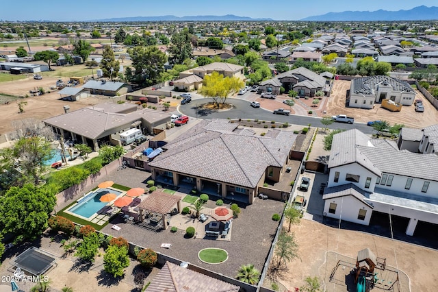 bird's eye view featuring a residential view and a mountain view