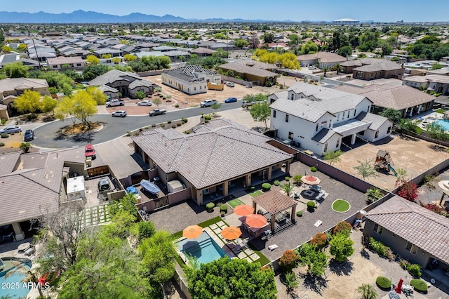 birds eye view of property with a residential view