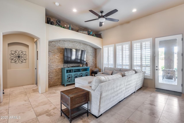 living room with tile patterned floors, ceiling fan, and recessed lighting