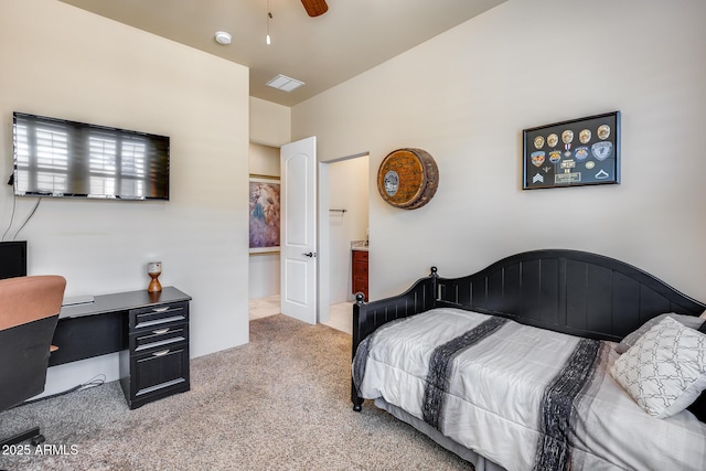 bedroom featuring carpet flooring, connected bathroom, and visible vents