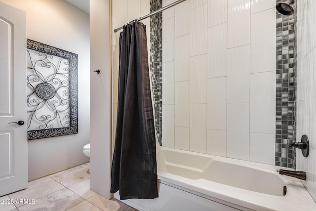 bathroom featuring toilet and shower / bath combination with curtain