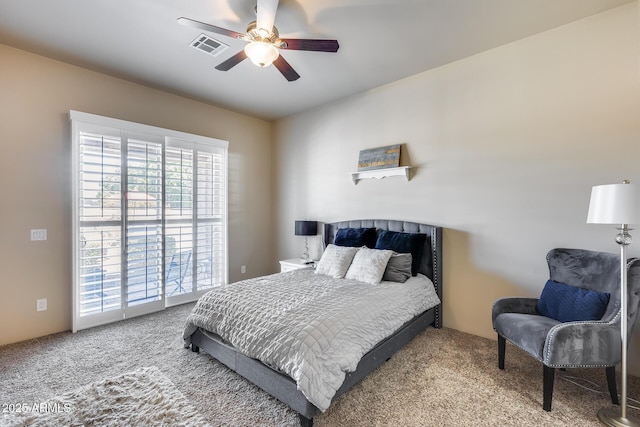 bedroom featuring carpet flooring, a ceiling fan, and visible vents