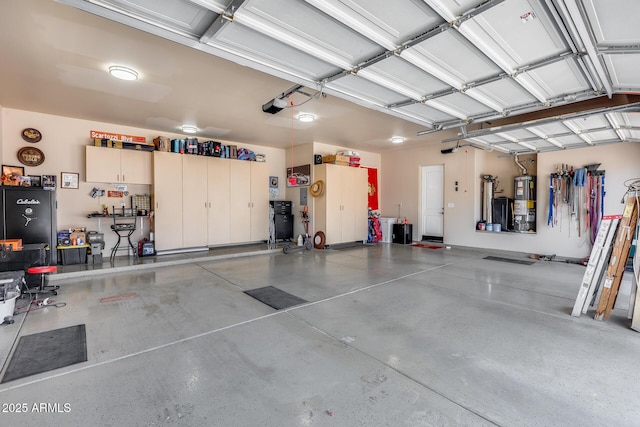 garage with a garage door opener and water heater