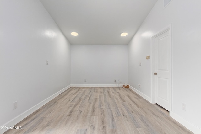 spare room featuring light hardwood / wood-style floors