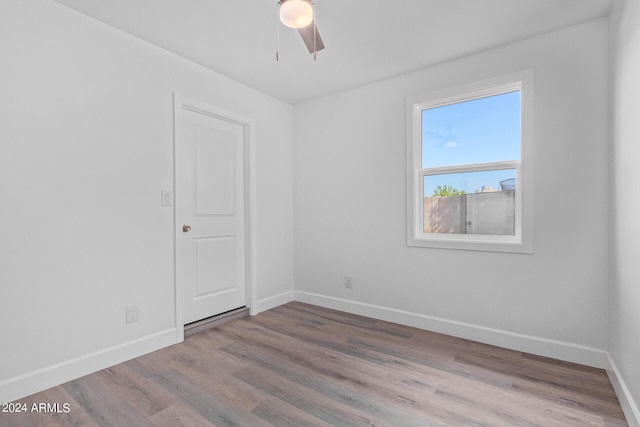 unfurnished room featuring wood-type flooring and ceiling fan