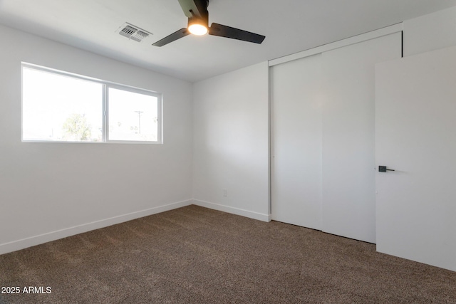 1205 W 7th St, Tempe, AZ 85281 - unfurnished bedroom with carpet flooring, a closet, and ceiling fan