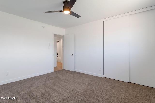 1205 W 7th St, Tempe, AZ 85281 - unfurnished bedroom with carpet flooring, a closet, a ceiling fan, and baseboards