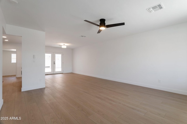 1205 W 7th St, Tempe, AZ 85281 - unfurnished room with ceiling fan, baseboards, and light wood-type flooring