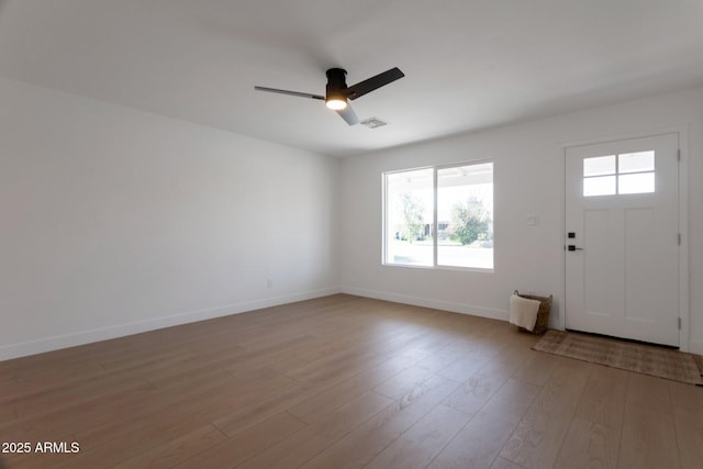 1205 W 7th St, Tempe, AZ 85281 - entryway featuring light wood finished floors, a ceiling fan, and baseboards