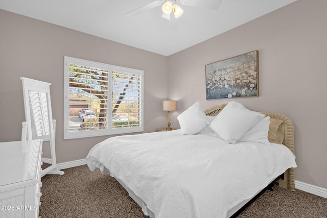 bedroom featuring ceiling fan, carpet, and baseboards