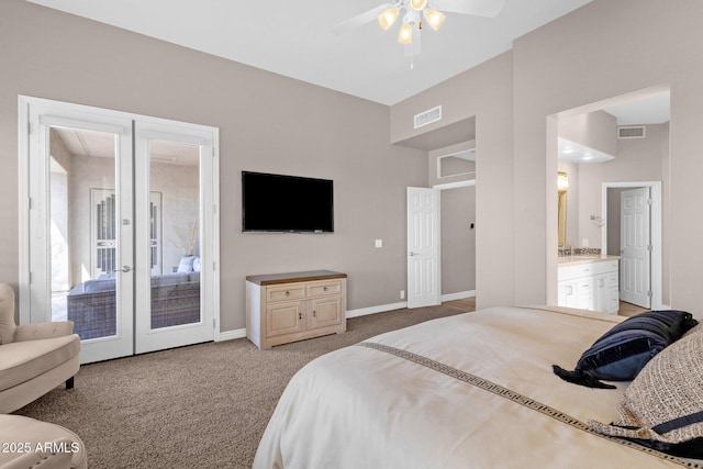 carpeted bedroom featuring french doors, visible vents, and baseboards