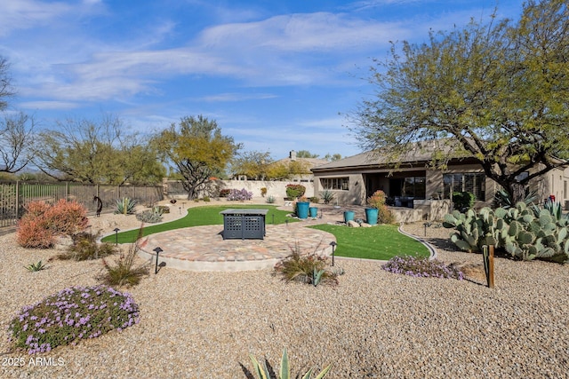 view of yard with a fenced backyard and a patio