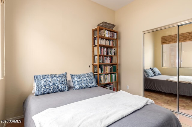 1851 W Periwinkle Way, Chandler, AZ 85248 - bedroom featuring a closet and tile patterned flooring