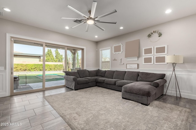 living room with ceiling fan