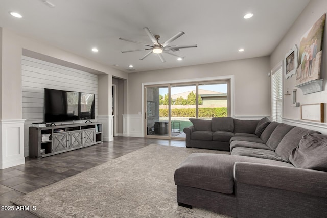 living room featuring ceiling fan