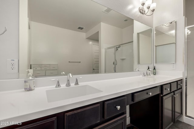 bathroom featuring vanity and walk in shower