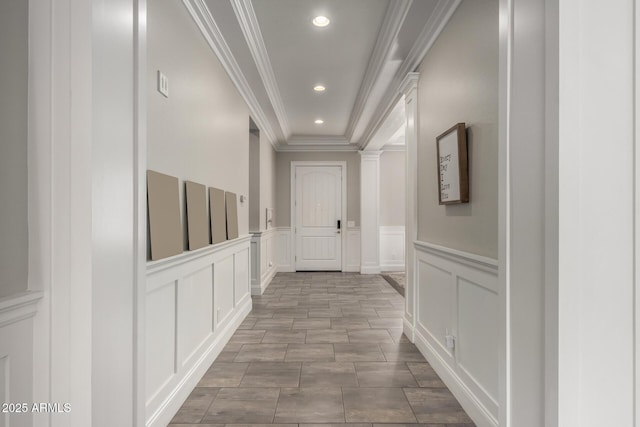 hallway featuring crown molding