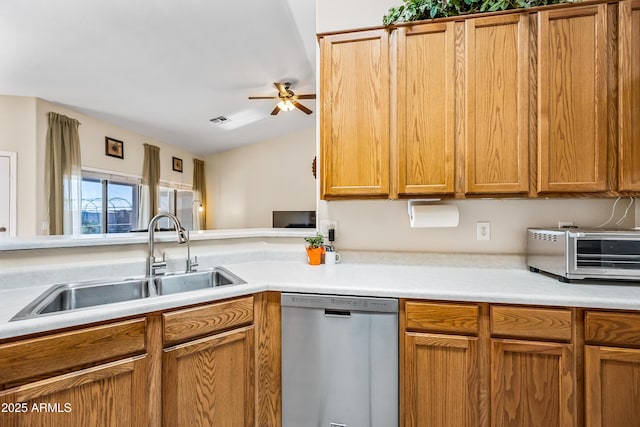 8479 E Sunrise Sky Dr, Gold Canyon, AZ 85118 - kitchen with vaulted ceiling, dishwasher, sink, ceiling fan, and kitchen peninsula
