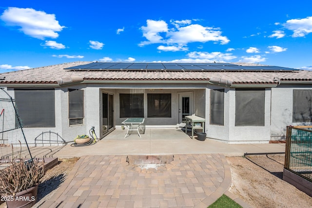 8479 E Sunrise Sky Dr, Gold Canyon, AZ 85118 - back of house featuring a patio and solar panels