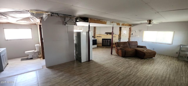 452 W Ray St, Superior, AZ 85173 - below grade area with a glass covered fireplace and a ceiling fan