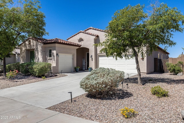 31332 N 137th Ln, Peoria, AZ 85383 - mediterranean / spanish home with a garage, a tiled roof, stucco siding, and driveway