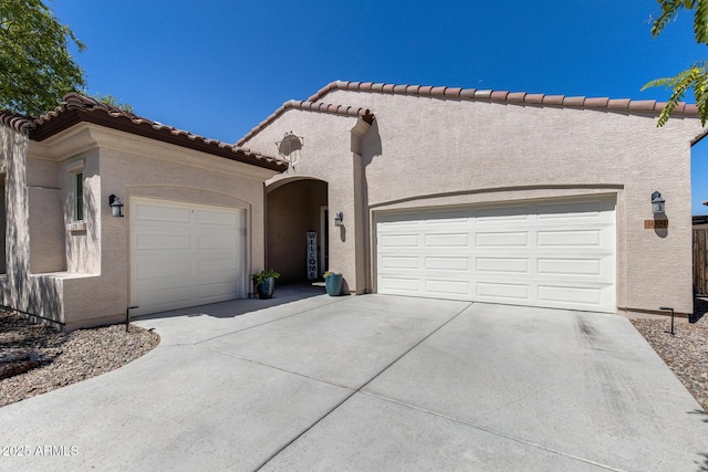 31332 N 137th Ln, Peoria, AZ 85383 - view of front facade with stucco siding, concrete driveway, a garage, and a tiled roof