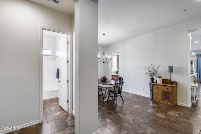 31332 N 137th Ln, Peoria, AZ 85383 - dining room featuring a chandelier and stone tile floors