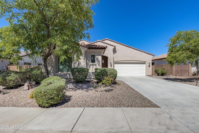 31332 N 137th Ln, Peoria, AZ 85383 - view of front of property with an attached garage, concrete driveway, stucco siding, and a tile roof
