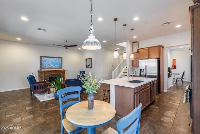 31332 N 137th Ln, Peoria, AZ 85383 - dining area with a ceiling fan, recessed lighting, and a fireplace