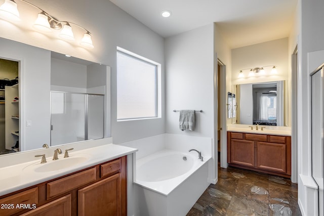 31332 N 137th Ln, Peoria, AZ 85383 - full bathroom with healthy amount of natural light, a stall shower, a bath, two vanities, and recessed lighting