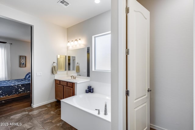 31332 N 137th Ln, Peoria, AZ 85383 - bathroom with vanity and a garden tub